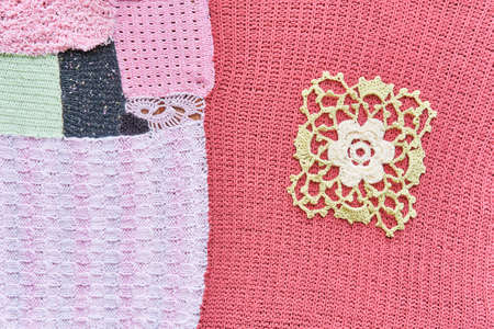 Different in texture, color and size pieces, knitted and crocheted are into one canvas.