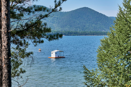 Floating bathhouse on water. Lake Baikal, Russia.の写真素材