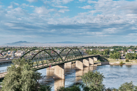 Old and new automobile bridges across the Selenga River, Ulan-Ude city, Republic of Buryatia, Russiaの写真素材