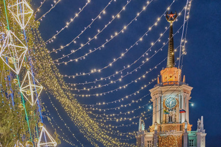 Decor on Christmas tree on backdrop of building of city administration of Yekaterinburg, Russia.の写真素材