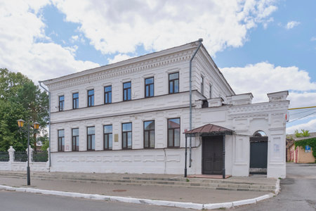 Yelabuga, Russia - June 18, 2023: Bautin's residential house - office of merchant Stakheev in historical downtown. Early 20th. Building in free eclectic forms with predominance of classicism elements.のeditorial素材