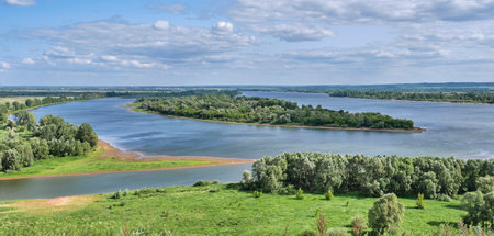 Confluence of two rivers Kama and Toyma near Yelabuga, Russia. Summer natural landscape. View from Devils hillfort. Banner. Copy spaceの写真素材