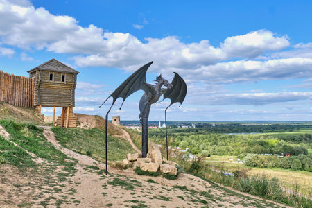 Yelabuga, Russia - June 18, 2023: Sculptural composition Dragon Oracle, Gataullin, 2016. Serpent-predictor, character of local legends. View of city and surrounding area, devil's hillfort,local landmarkのeditorial素材
