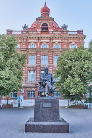 Elabuga, Russia - June 18, 2023: Monument to one of representatives of merchant dynasty, writer Stakheev. Golovachev, Demchenko, 2003. Located in front of the building of State Pedagogical University.のeditorial素材