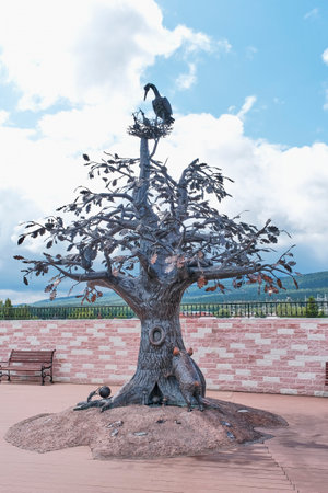 Zlatoust, Russia - June 20, 2023: Mountain Park named after Bazhov, tourist attraction of Southern Urals. Oak of Life, forged and welded copper sculpture. It housed 22 birds, animals, insectsのeditorial素材