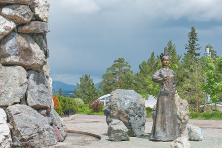 Zlatoust, Russia - June 20, 2023: Park of Culture and Leisure,Mountain Park named after Bazhov,tourist attraction of Southern Urals.Sculpture, character from Bazhovs tales, Mistress of Copper Mountainのeditorial素材