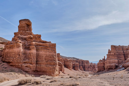 Path along valley of Castles Gorge, Charyn Canyon National Nature Park in Kazakhstan. Natural monument, formed by water, wind and time, landmark near Almaty. Spring landscapeの写真素材