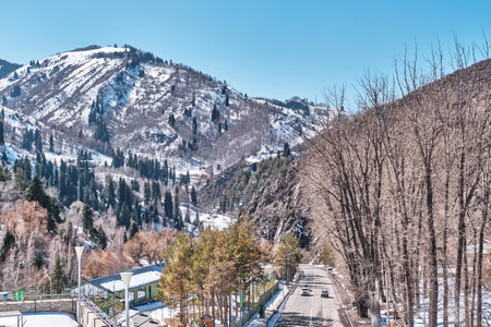 Road at Shymbulak ski resort, Almaty, Kazakhstan. Located in Medeo Valley in Trans-Ili Alatau mountain range. winter landscapeの写真素材
