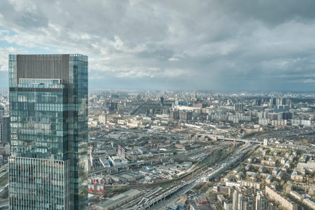 View of city from observation deck of Moscow Cities skyscraper. Neva Tower, formerly Renaissance...