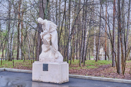 Moscow, Russia - April 15, 2024: Sculpture Mountain climber, 1954, sculptor Evgeny Abalakov. Installed next to Physical Education and Sports pavilion at VDNKh. Spring landscape.のeditorial素材