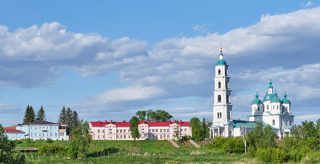 Tourist street Naberezhnaya or Embankment in historical center of city Yelabuga, Tatarstan, Russia. View from park. Landmarks - Memorial House-Museum of Shishkin, Spassky Cathedral. Bannerの写真素材