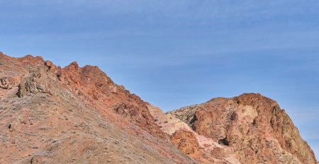 Hills landscape of Charyn Canyon, National Park in Kazakhstan, near Almaty, over background of blue sky. Natural monument in springtime, tourist landmark. Copy space.の写真素材