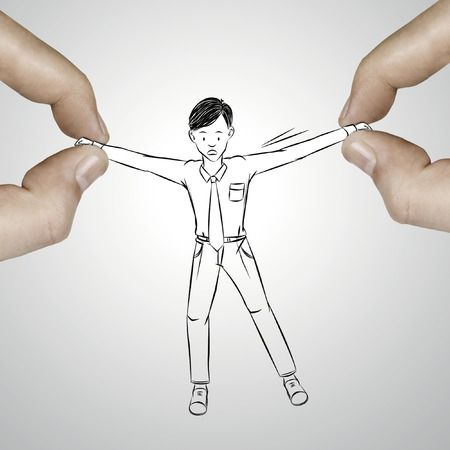 Pulling businessman handの写真素材