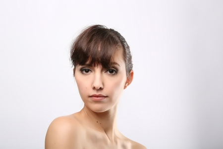 portrait of the woman with beauty face isolated on whiteの写真素材