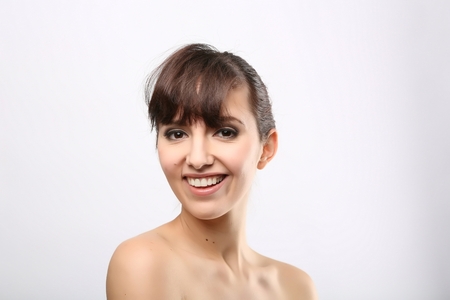 portrait of the woman with beauty face isolated on whiteの写真素材