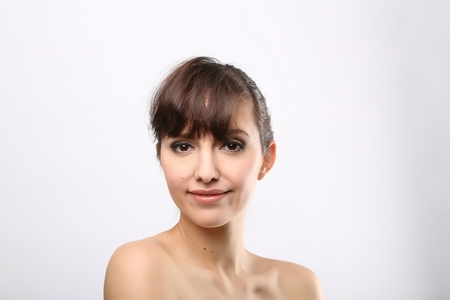portrait of the woman with beauty face isolated on whiteの写真素材