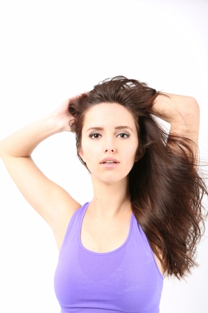 Beauty Girl portrait with long Hair. Beautiful Brunette Woman with Blowing Healthy Hair. Natural Beautyの写真素材