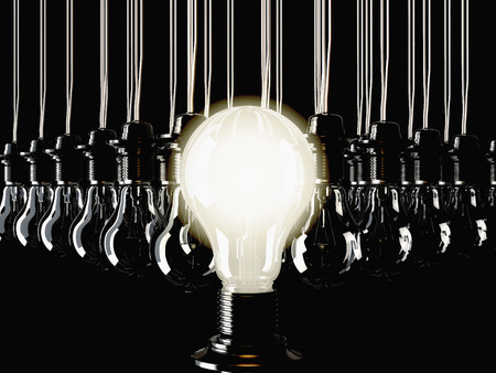 An illuminated fluorescent light bulb connected to an electrical cable