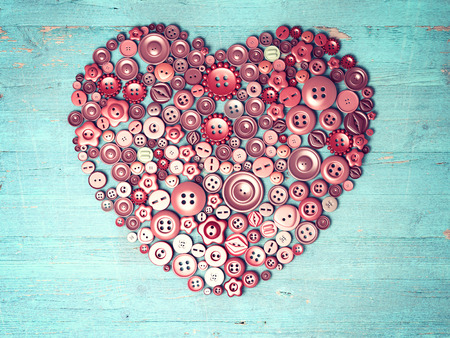 Red heart background on vintage old surfaceの写真素材