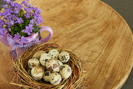 colorful easter eggs on a wooden backgroundの写真素材