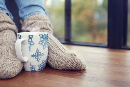 Close up on feet. Winter and Christmas holidays concept.の写真素材