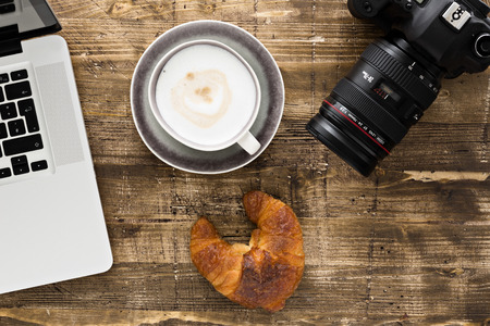 office in the morning. croissant and coffeeの写真素材
