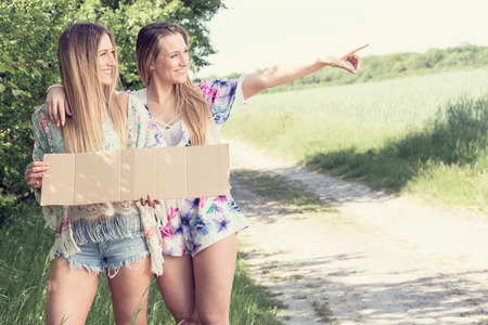 female twins looking for adventure vacations. individual tripsの写真素材