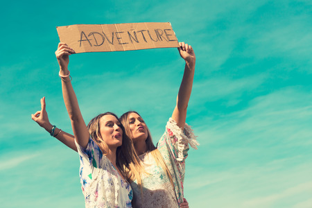 female twins looking for adventure vacations. individual tripsの写真素材