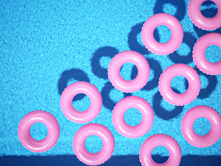 luxury swimming pool in summer. 3d renderingの写真素材