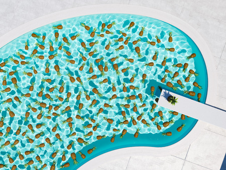 pineapples swimming in a blue pool. 3d renderingの写真素材