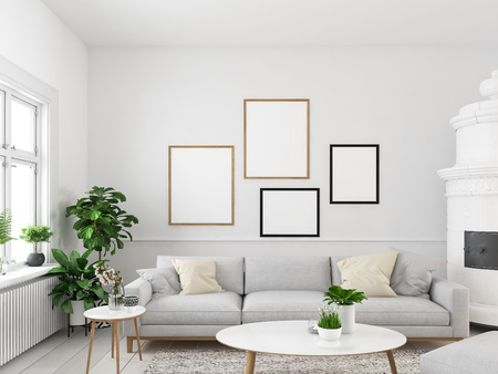 living room with empty picture frames and fireplace. 3d renderingの写真素材