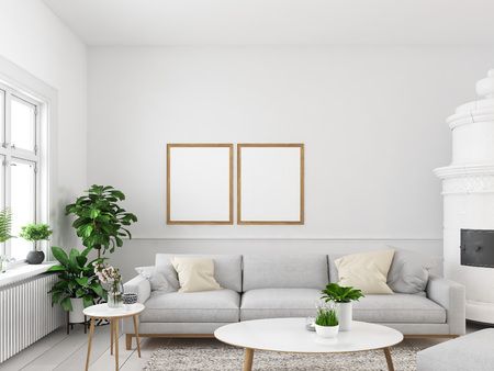 living room with empty picture frames and fireplace. 3d renderingの写真素材