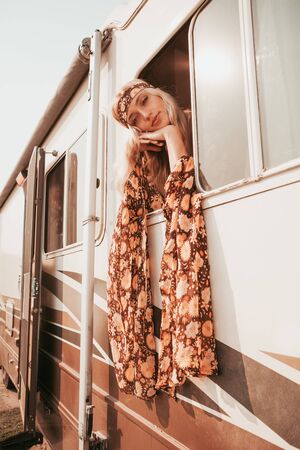 retro campervan with hippie californiagirl. california van lifestyleの写真素材