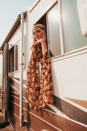retro campervan with hippie californiagirl. california van lifestyleの写真素材