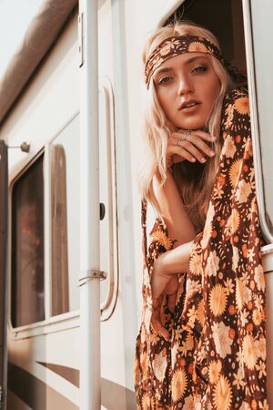 retro campervan with hippie californiagirl. california van lifestyleの写真素材