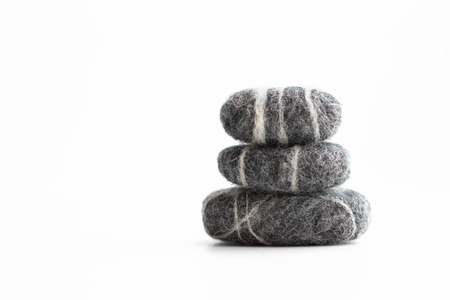Stack of three needle felted stones, wool handmade home decorの写真素材