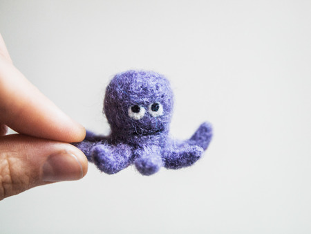 Miniature needle felted octopus, wool handmade toyの写真素材