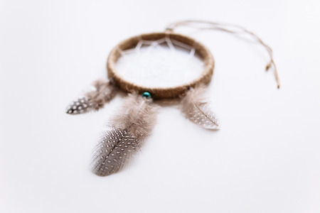 Dreamcatcher with three feathersの写真素材
