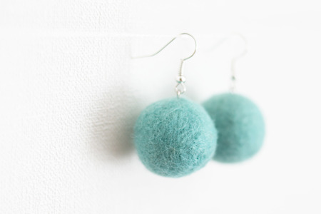 Felt balls earringsの写真素材