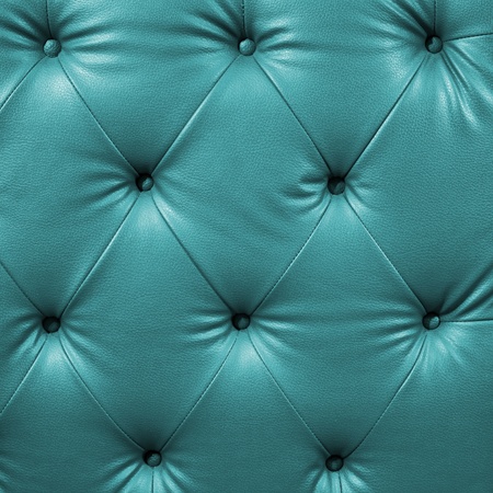 Close up cyan luxury buttoned black leatherの写真素材