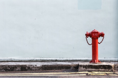 Red Fire pumps on the streetの写真素材