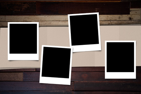 photo frame on wood background for decorationの写真素材