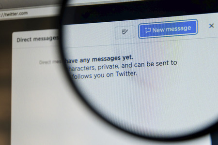 THAILAND - SEPTEMBER 2, 2014: Magnifying glass of twitter page compose new message view on web browser.のeditorial素材