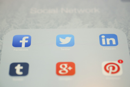 CHIANG MAI, THAILAND - OCTOBER 03, 2014: All of popular social media icons on Apple ipad Air device screen.のeditorial素材