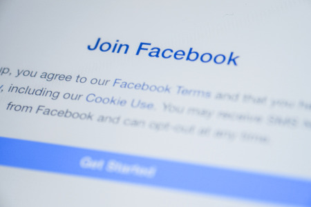 CHIANG MAI, THAILAND - OCTOBER 03, 2014: Facebook application join us page Apple iPad Air.のeditorial素材