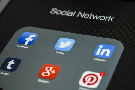 CHIANG MAI, THAILAND - OCTOBER 03, 2014: All of popular social media icons on Apple ipad Air device screen.のeditorial素材