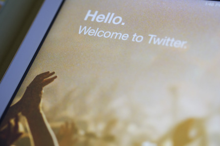 CHIANG MAI, THAILAND - OCTOBER 03, 2014: Twitter application sign in page Apple iPad Air. Twitter is largest and most popular social networking site in the world.のeditorial素材