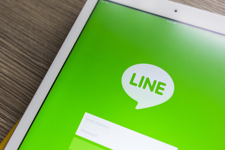 CHIANG MAI, THAILAND - OCTOBER 21, 2014: Line application chat message on Apple iPad Air device. Line is a Japanese proprietary application for instant messaging on smartphones and personal computersのeditorial素材