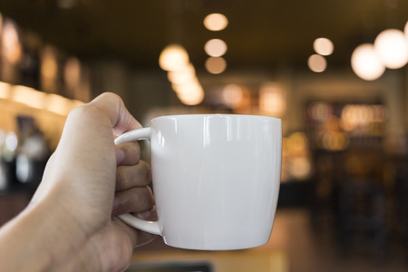 CHIANG MAI, THAILAND - OCTOBER 02, 2014: Starbucks coffee caramel latte white mug in Starbucks Cafe Chiang Mai Thailand. Starbucks is the largest coffeehouse company in the world.のeditorial素材