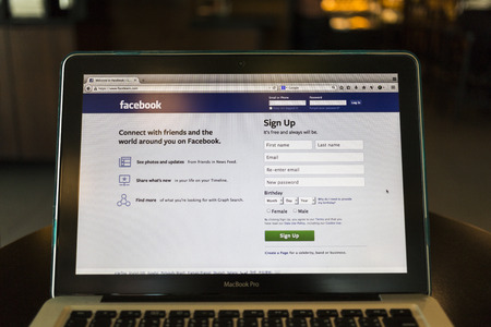 CHIANG MAI, THAILAND - OCTOBER 02, 2014: Facebook application sign in page on Apple macbook pro. Facebook is largest and most popular social networking site in the world.のeditorial素材